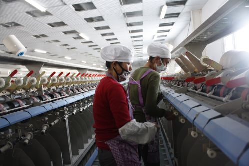 新疆金泰合纺织合股纱生产线项目投产